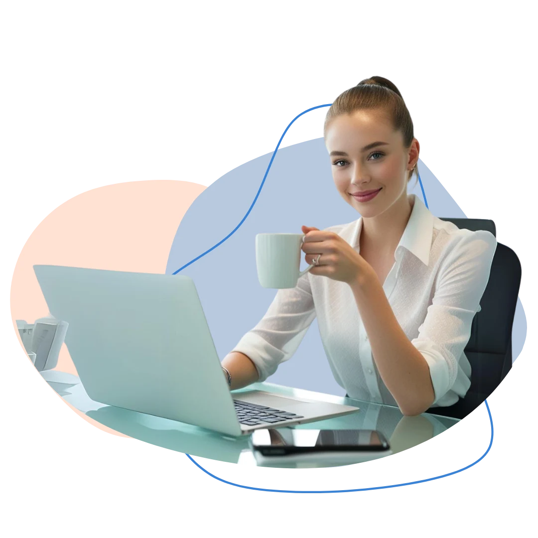 Assisti - a woman holding coffee cup sitting on a desk with a laptop in front of her